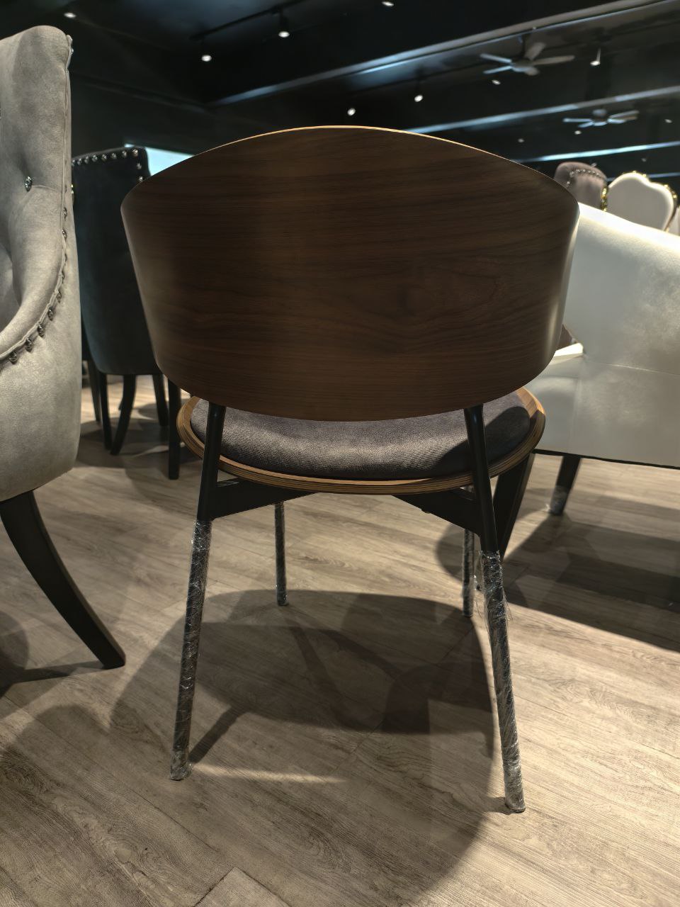 Wooden chair with metal legs
