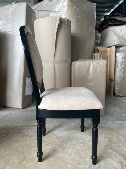 Side warehouse view of a cream Roma dining chair